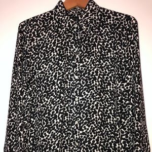 Black and white top or blouse.